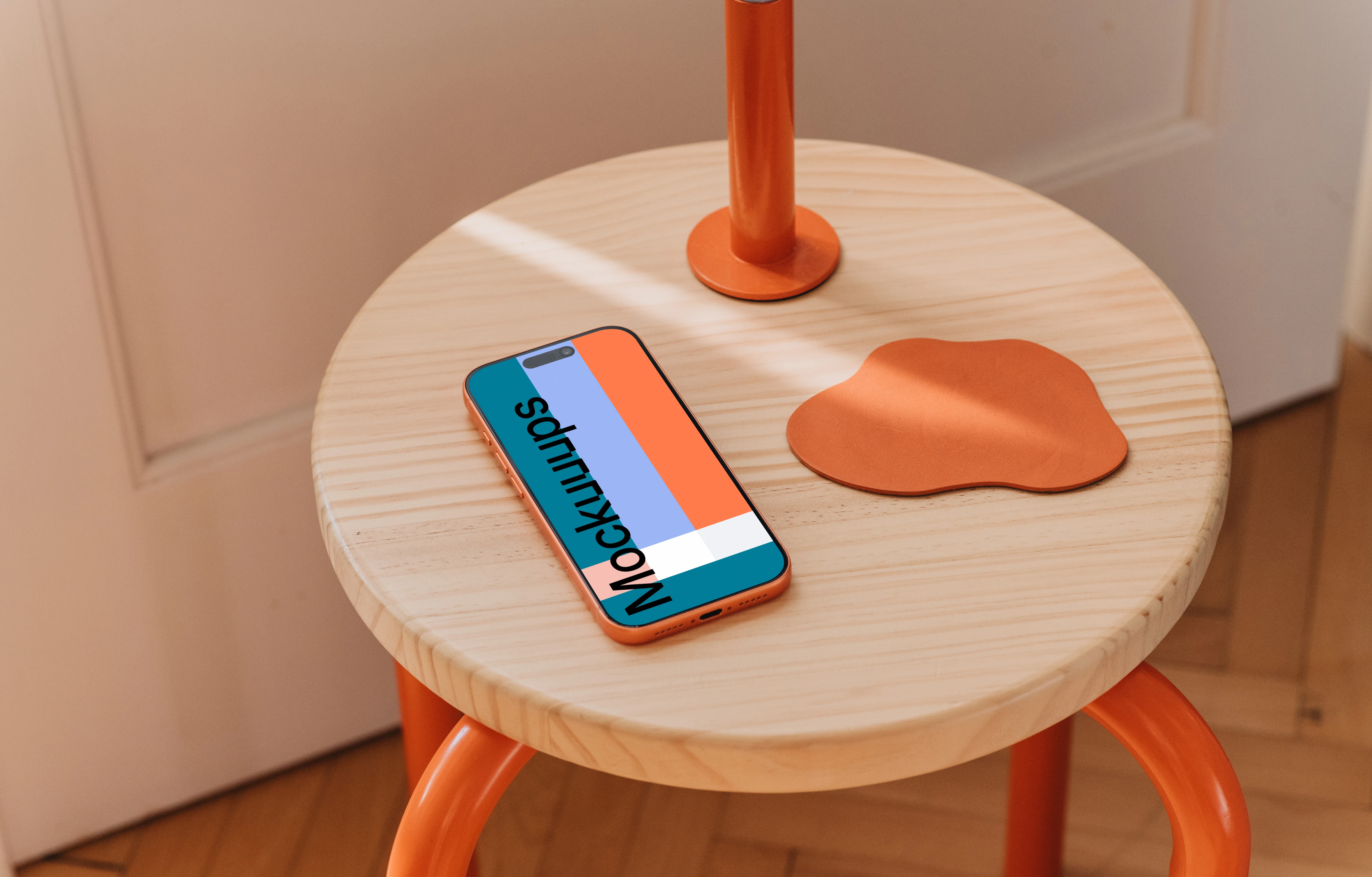 iPhone 17 Pro mockup on a wooden stool