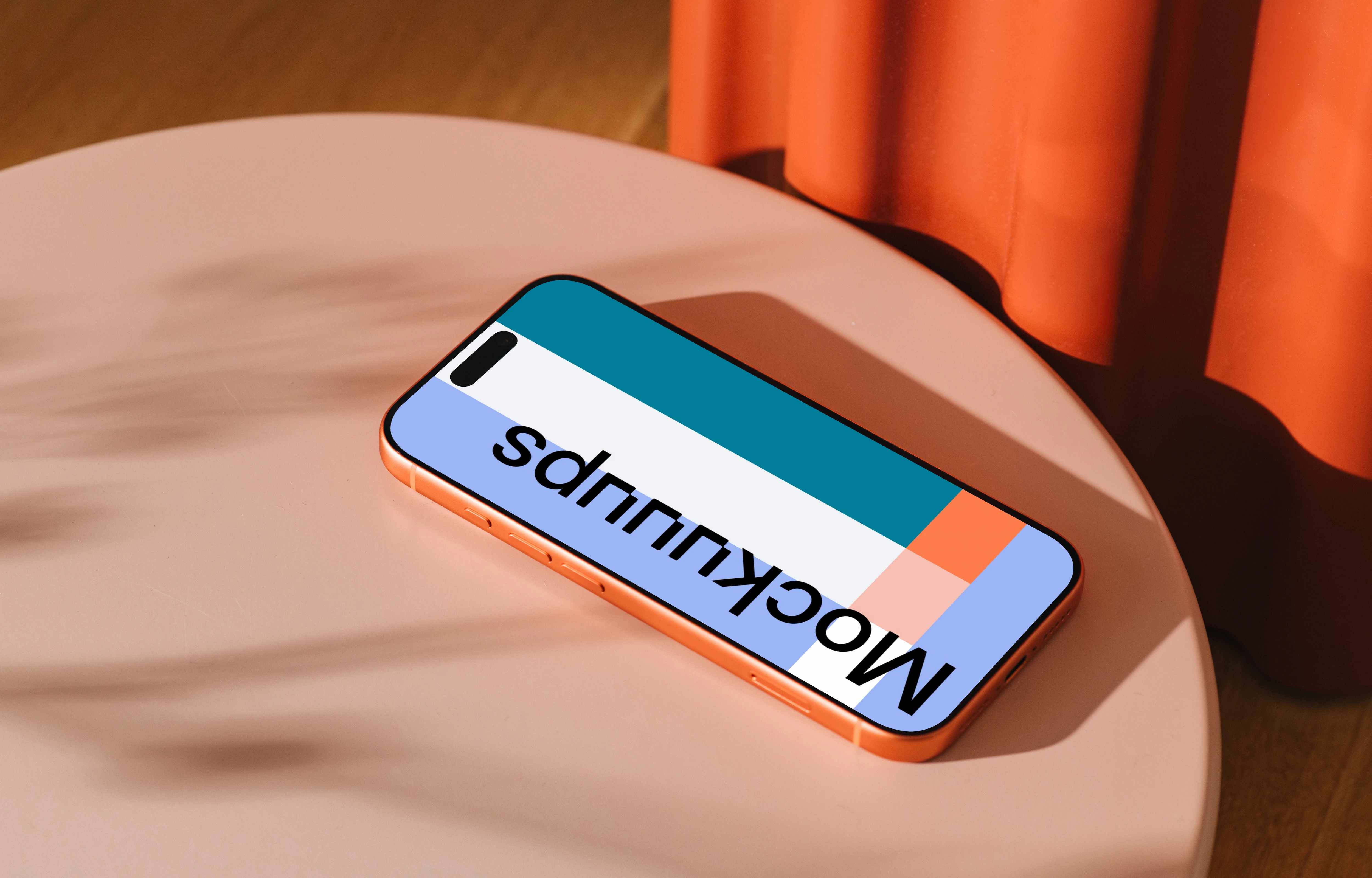 iPhone 17 Pro mockup on a pink round table