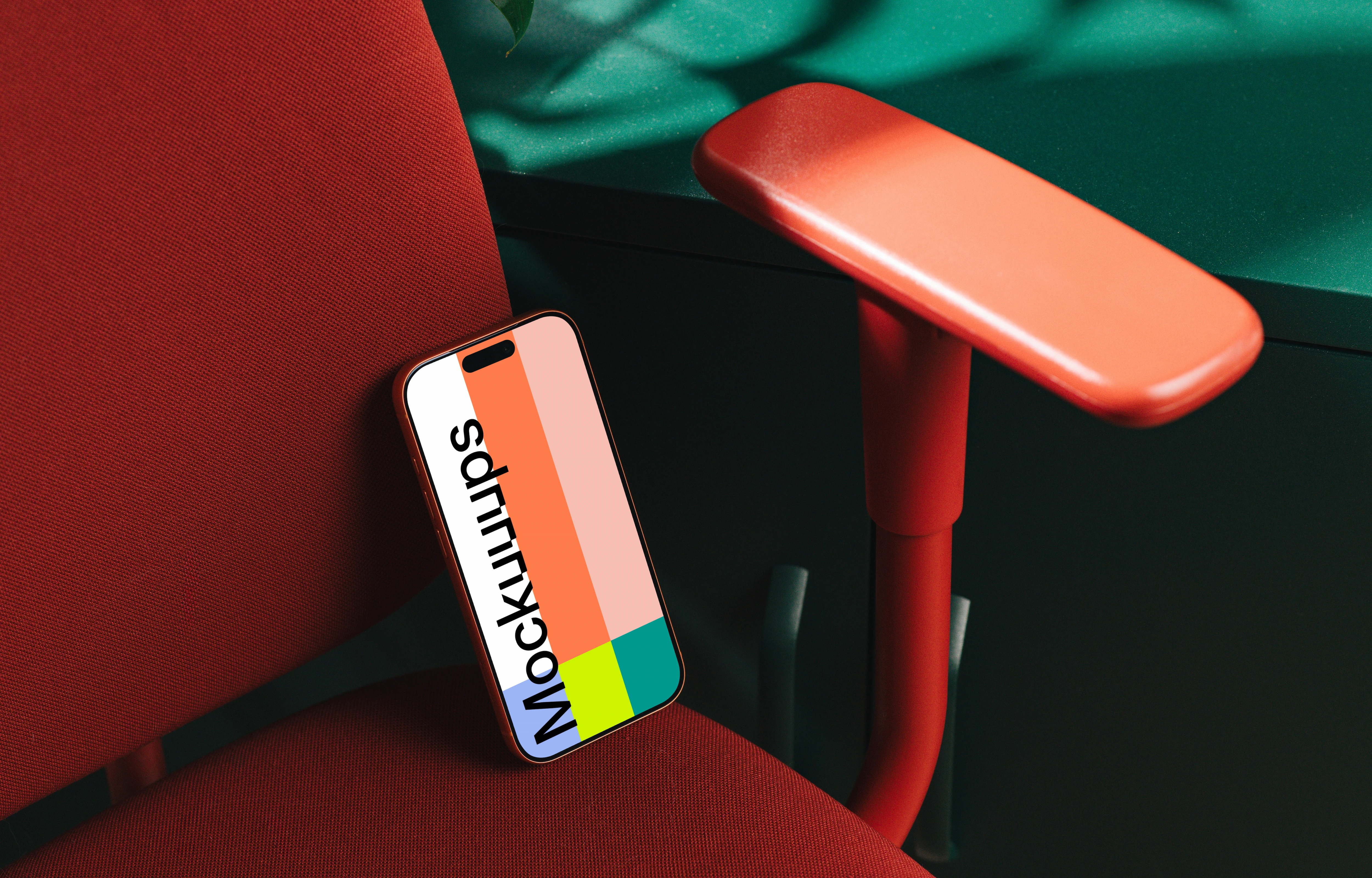 iPhone 17 Pro mockup on a red office chair