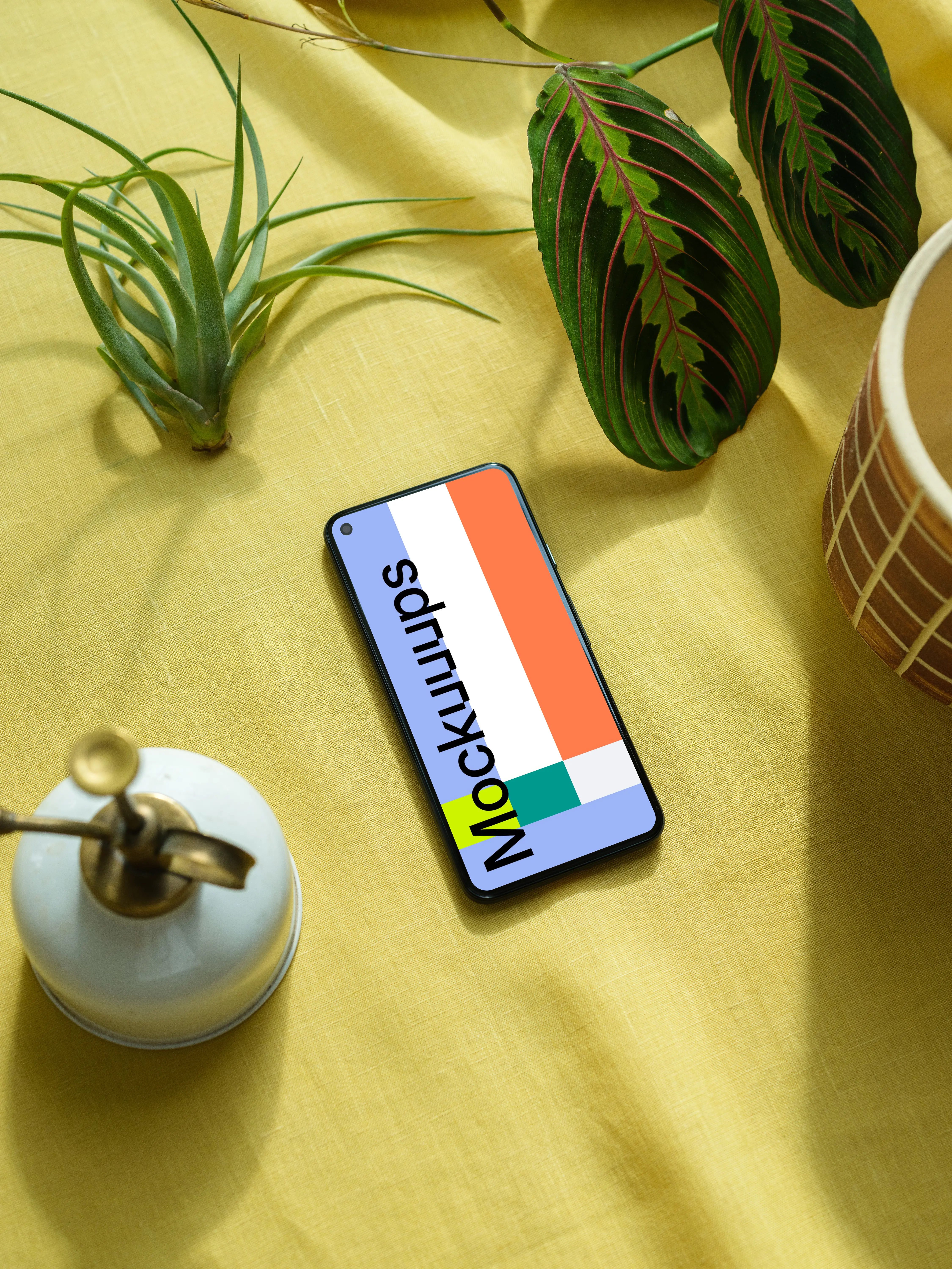 Pixel 5 mockup on a yellow table