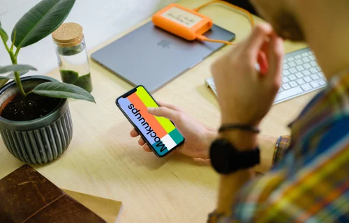 Man browsing on the iPhone 11 mockup