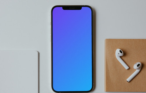 Minimal iPhone mockup on a white table