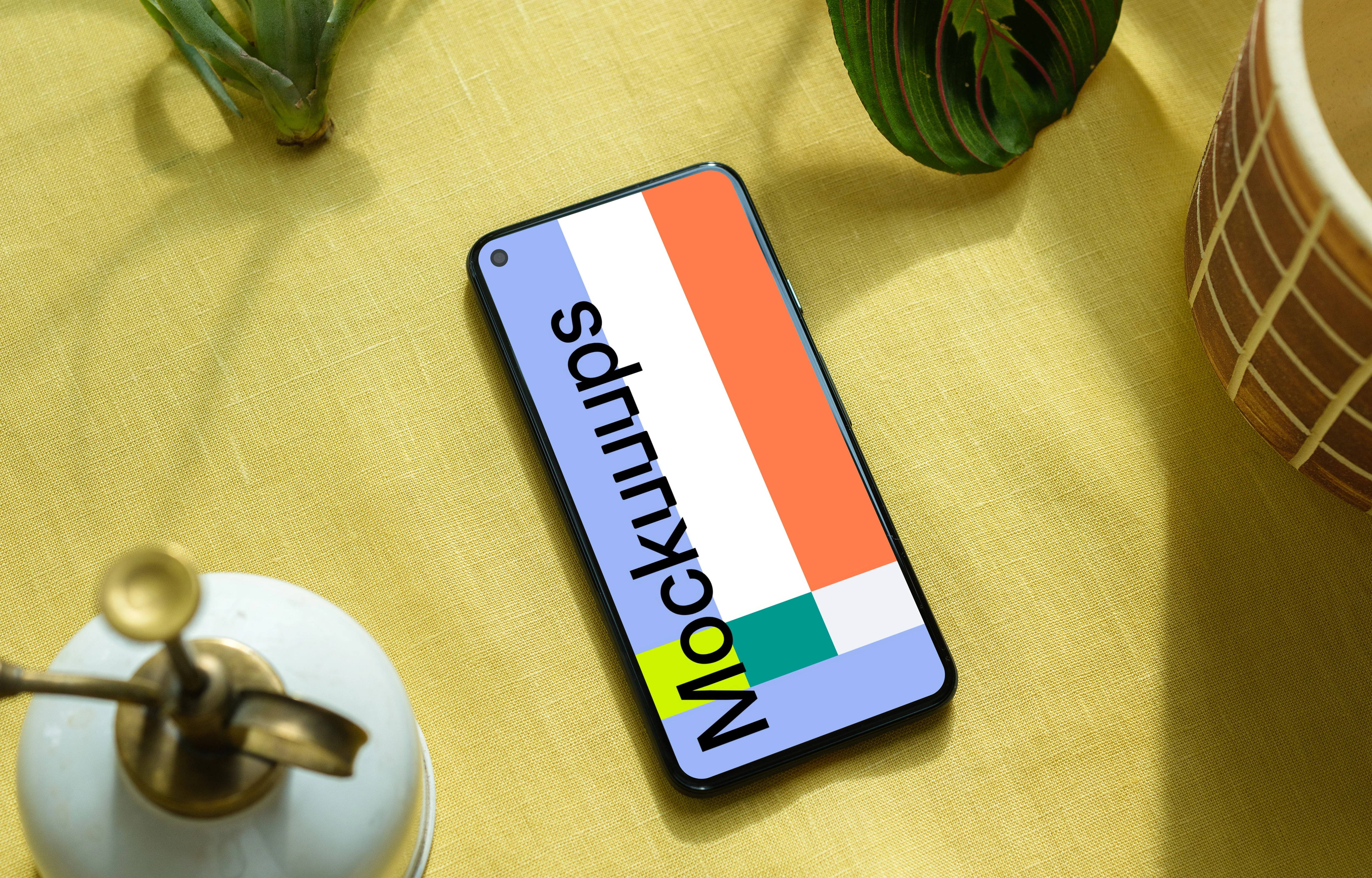 Pixel 5 mockup on a yellow table