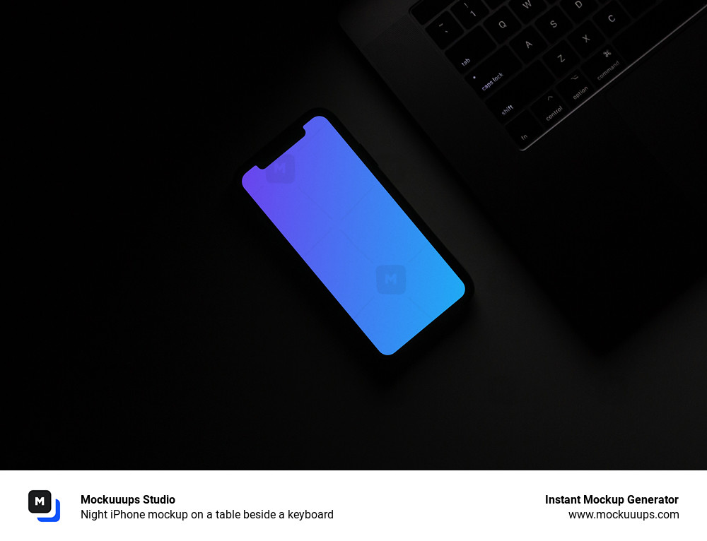 Night iPhone mockup on a table beside a keyboard