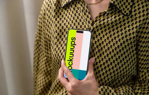 iPhone 15 Pro mockup in a woman's hand