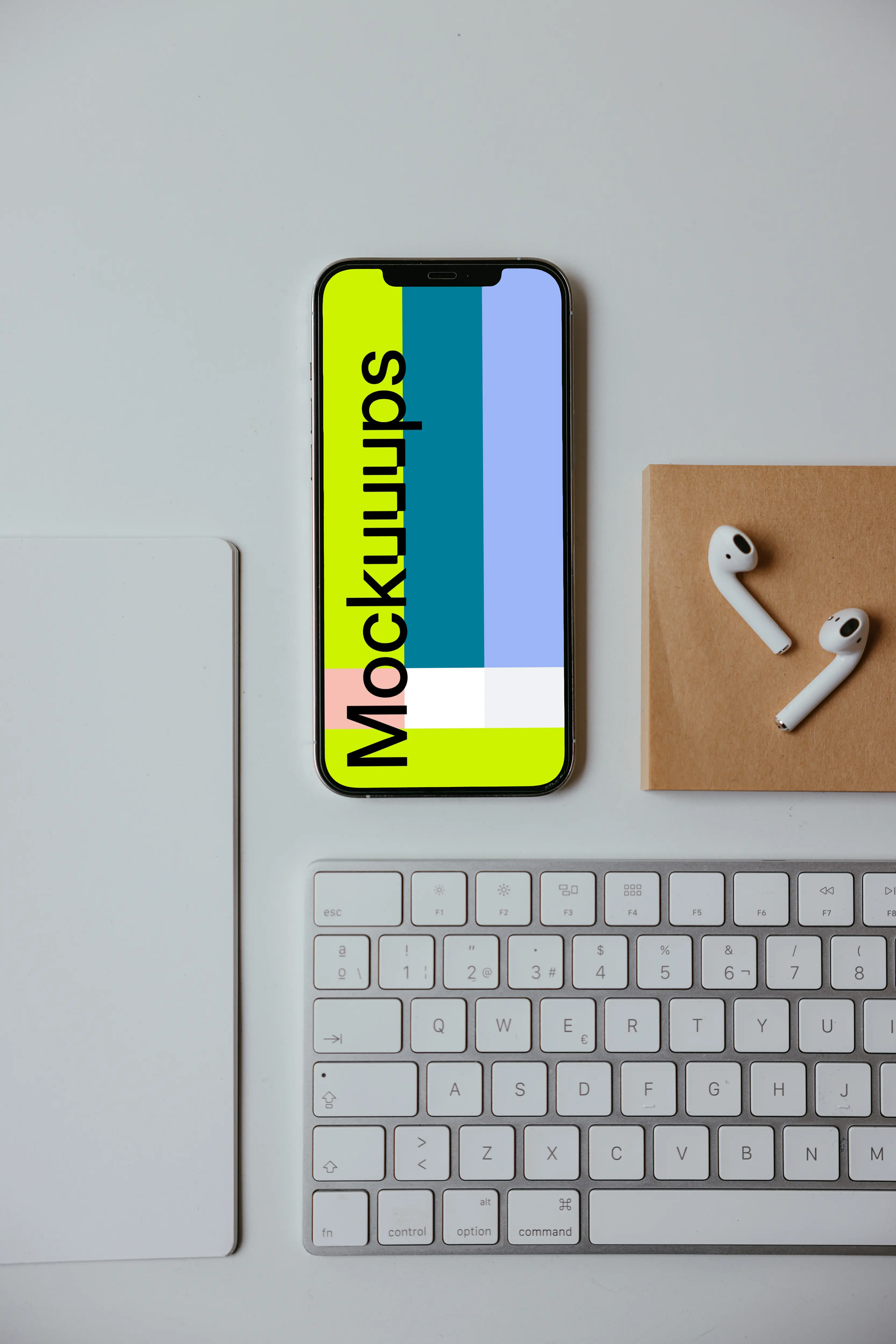 Minimal iPhone mockup on a white table