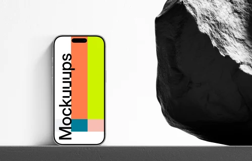 iPhone next to the rock mockup