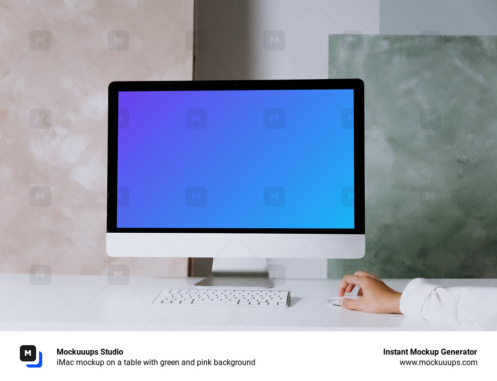 iMac mockup on a table with green and pink background