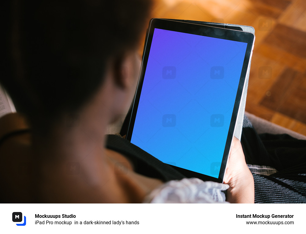 iPad Pro mockup in a dark-skinned lady's hands