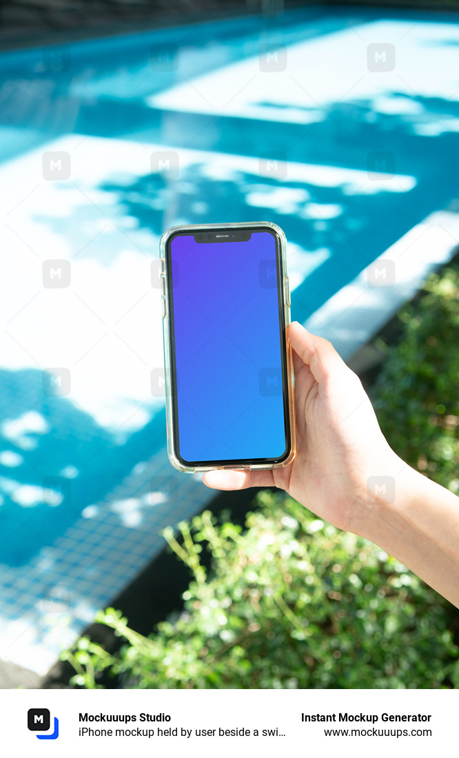 iPhone mockup held by user beside a swimming pool