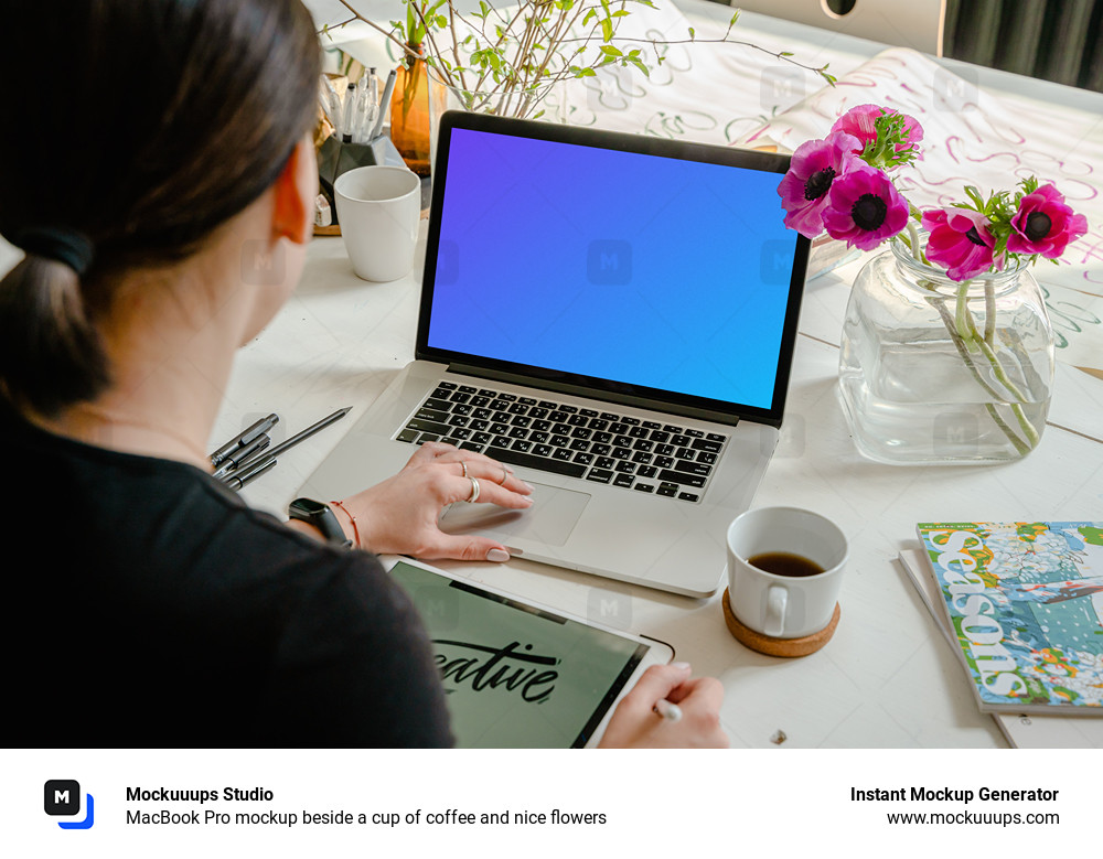MacBook Pro mockup beside a cup of coffee and nice flowers