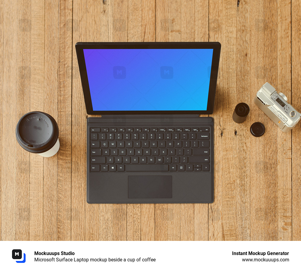 Microsoft Surface Laptop mockup beside a cup of coffee