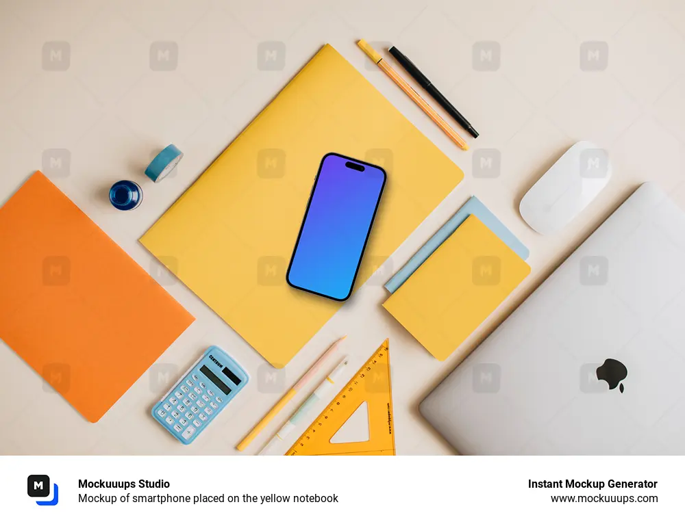 Mockup of smartphone placed on the yellow notebook