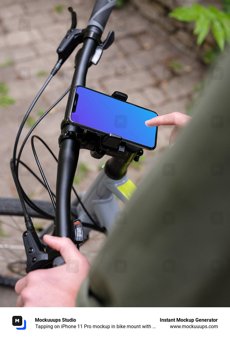Tapping on iPhone 11 Pro mockup in bike mount with handlebars to the side