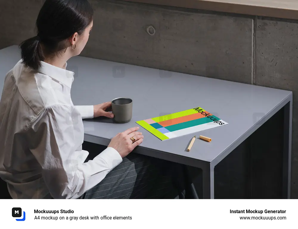 A4 mockup on a gray desk with office elements