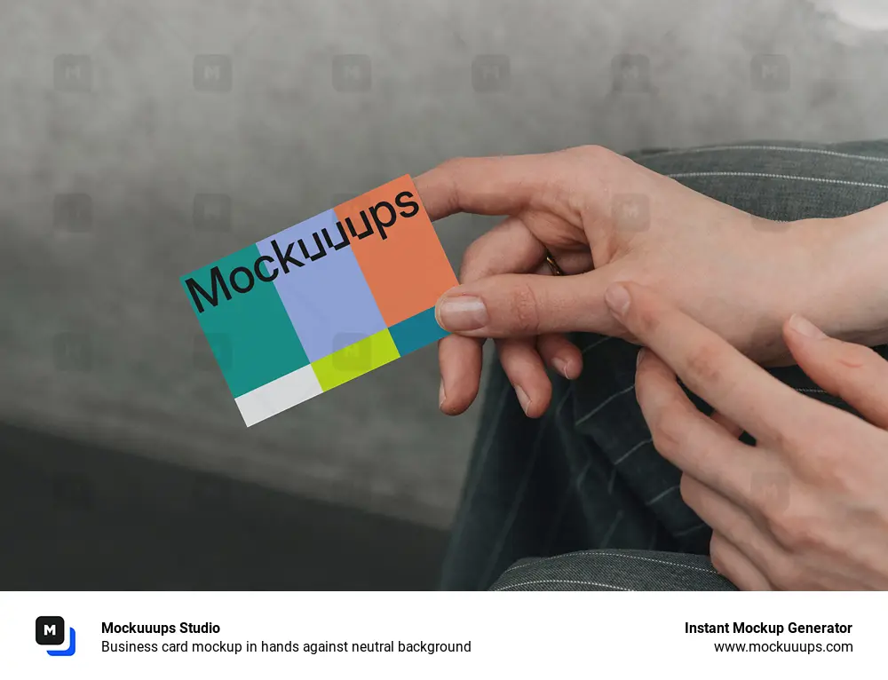 Business card mockup in hands against neutral background