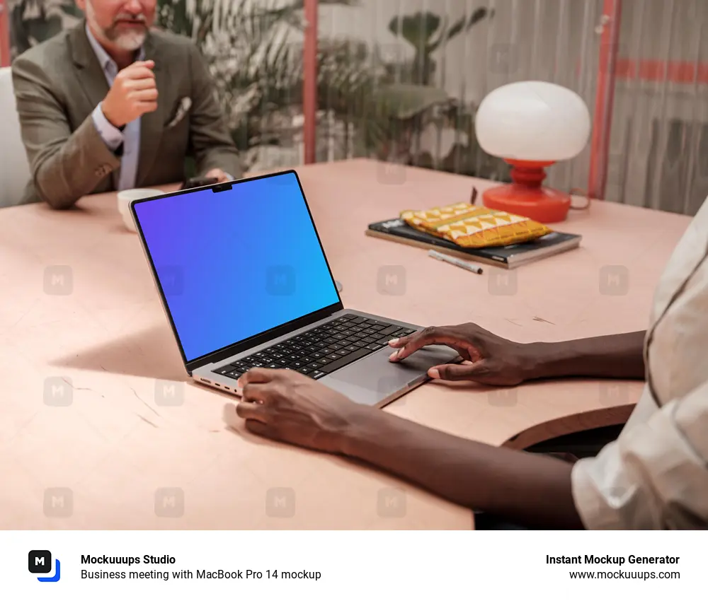 Business meeting with MacBook Pro 14 mockup