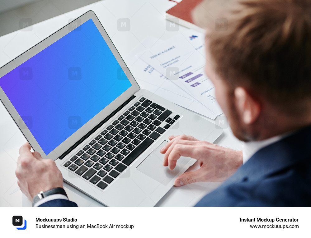 Businessman using an MacBook Air mockup