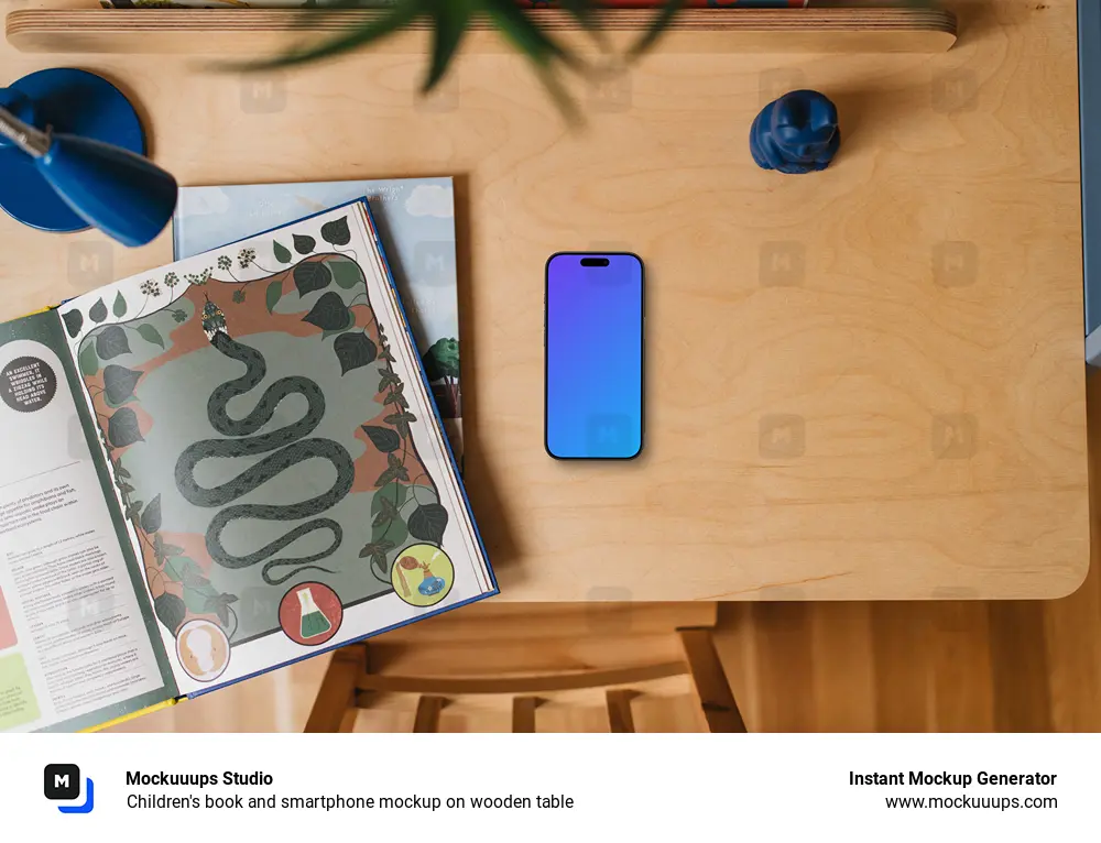 Children's book and smartphone mockup on wooden table