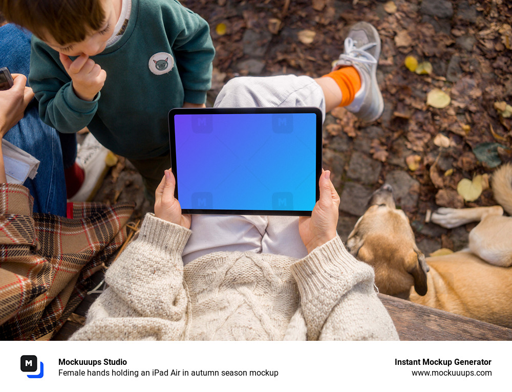 Female hands holding an iPad Air in autumn season mockup