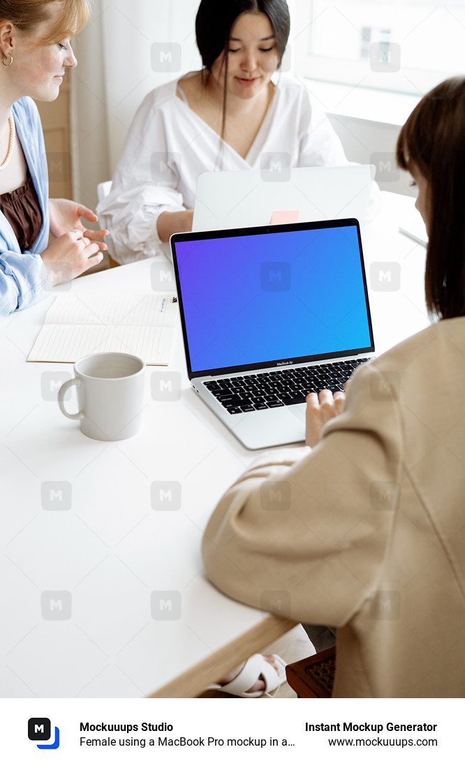 Female using a MacBook Pro mockup in a meeting