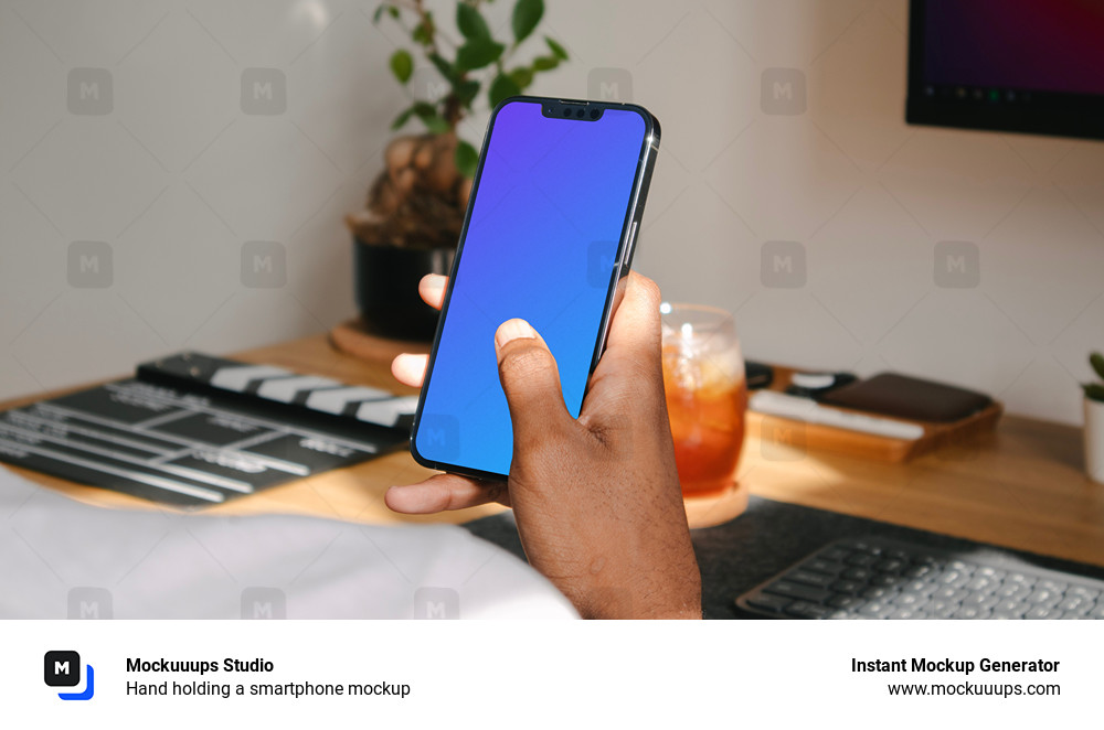 Hand holding a smartphone mockup