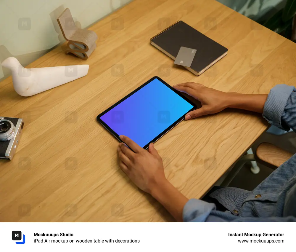 iPad Air mockup on wooden table with decorations