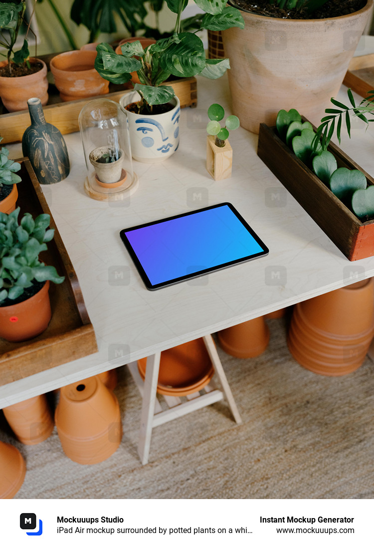 iPad Air mockup surrounded by potted plants on a white table