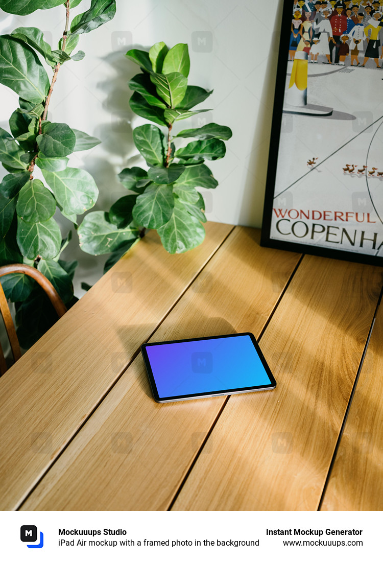 iPad Air mockup with a framed photo in the background