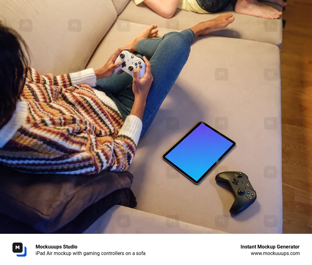 iPad Air mockup with gaming controllers on a sofa