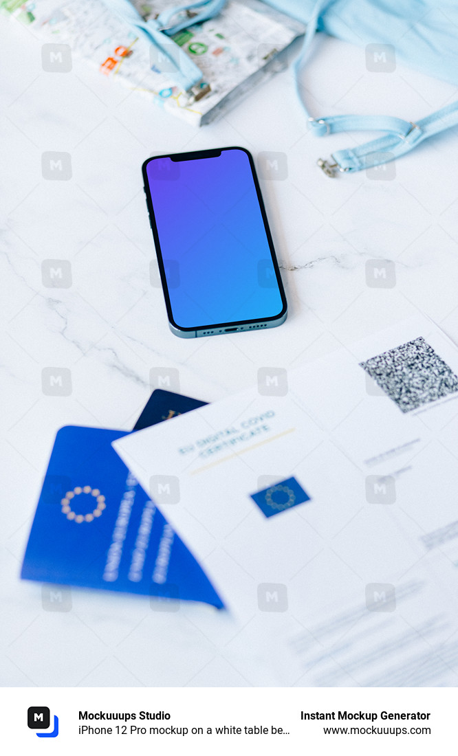 iPhone 12 Pro mockup on a white table beside a bikini