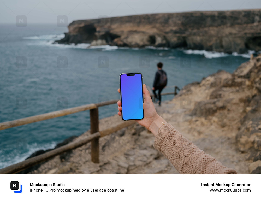 iPhone 13 Pro mockup held by a user at a coastline