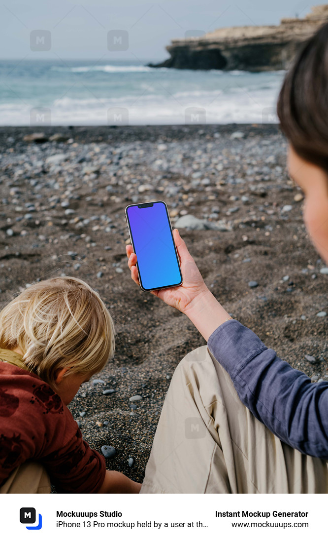 iPhone 13 Pro mockup held by a user at the beach