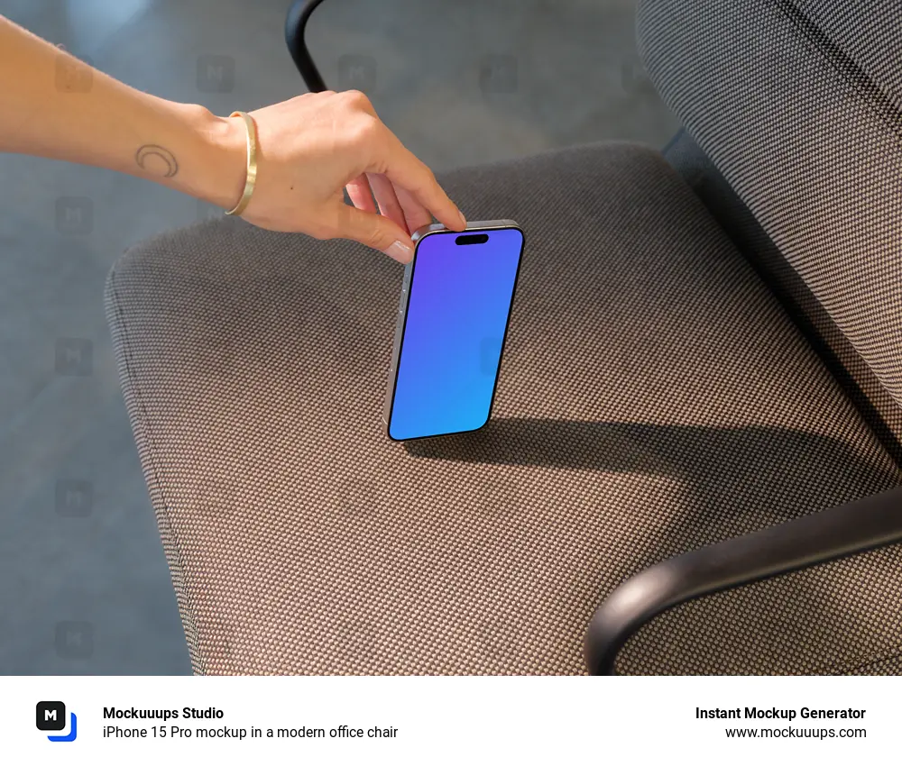 iPhone 15 Pro mockup in a modern office chair