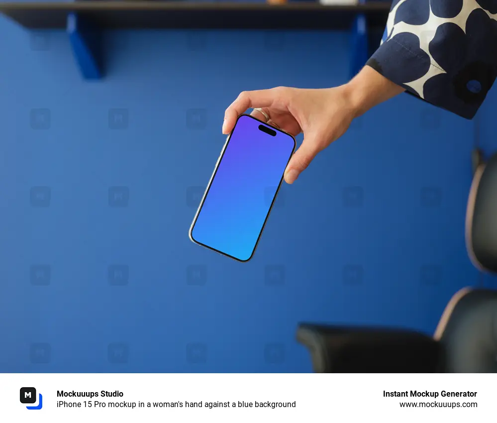 iPhone 15 Pro mockup in a woman's hand against a blue background