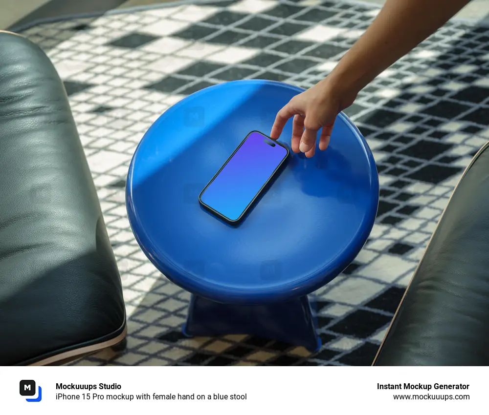 iPhone 15 Pro mockup with female hand on a blue stool