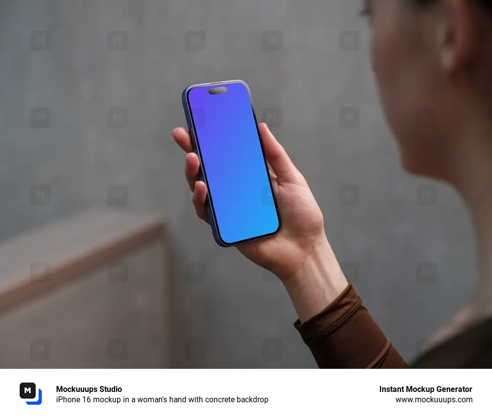 iPhone 16 mockup in a woman's hand with concrete backdrop