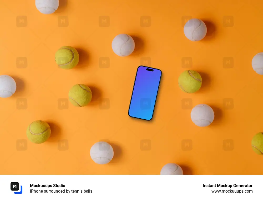 iPhone surrounded by tennis balls