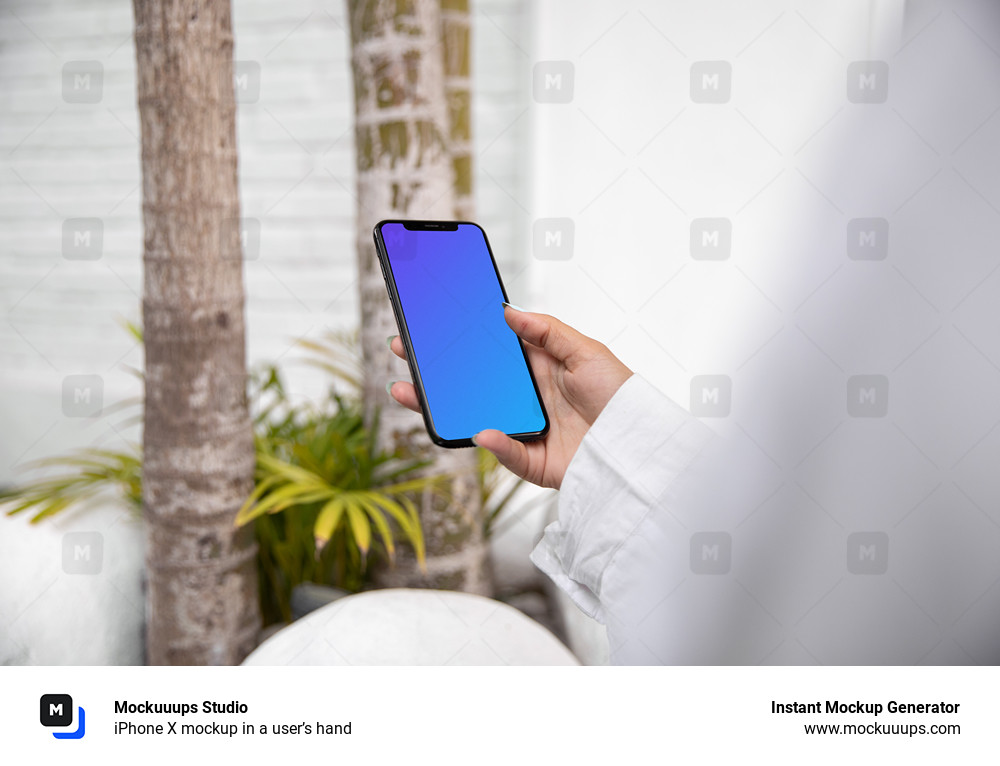 iPhone X mockup in a user’s hand