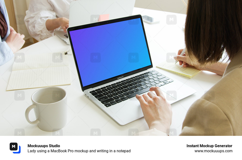 Lady using a MacBook Pro mockup and writing in a notepad