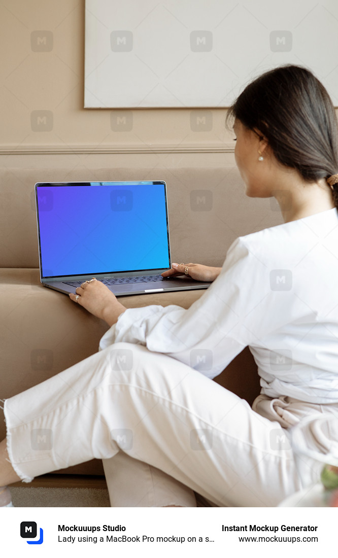 Lady using a MacBook Pro mockup on a sofa