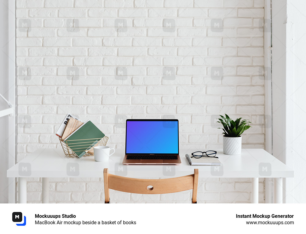 MacBook Air mockup beside a basket of books