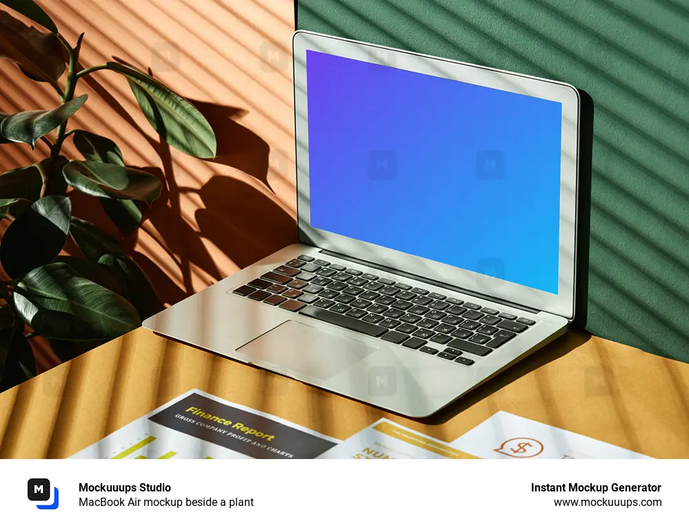 MacBook Air mockup beside a plant