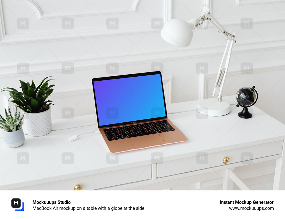 MacBook Air mockup on a table with a globe at the side