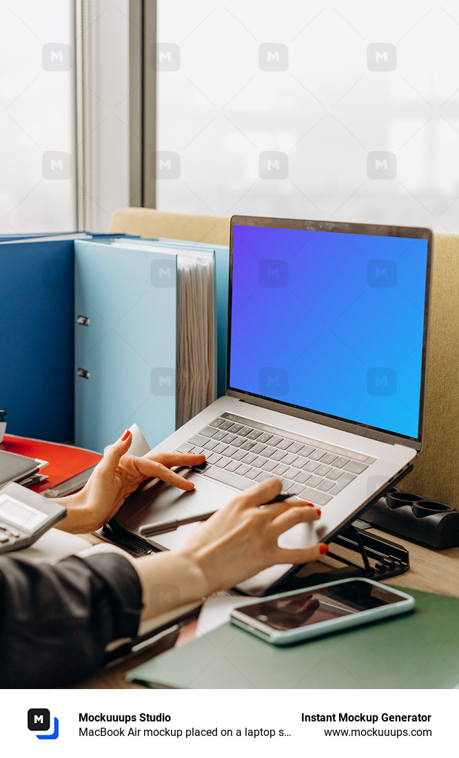 MacBook Air mockup placed on a laptop stand