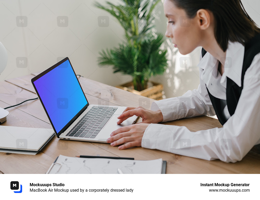 MacBook Air Mockup used by a corporately dressed lady 