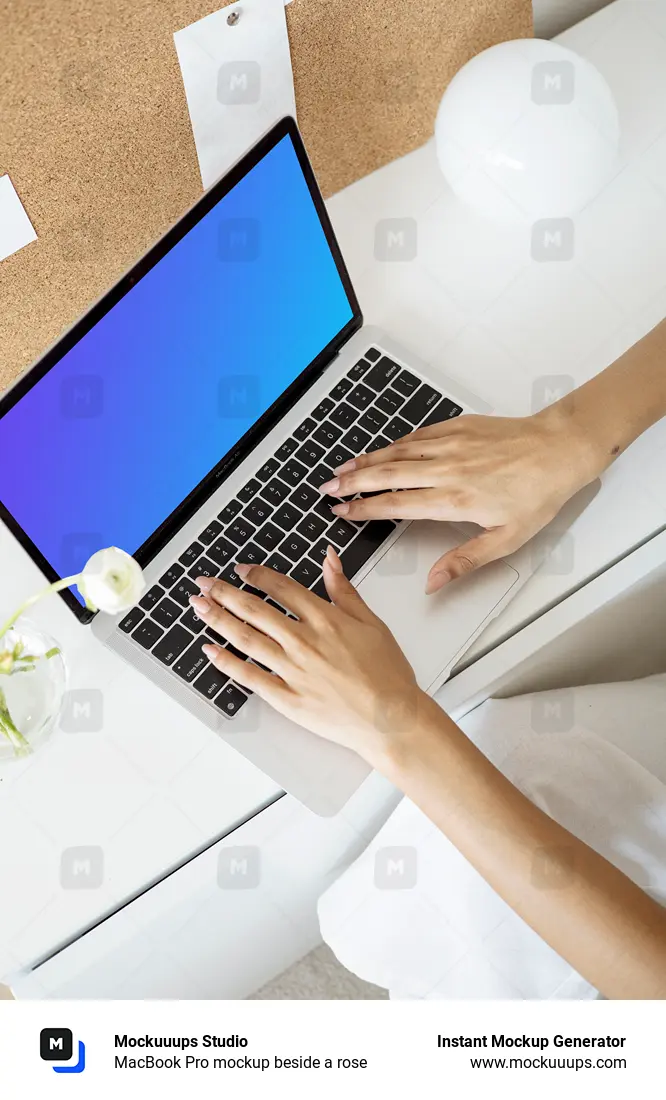 MacBook Pro mockup beside a rose