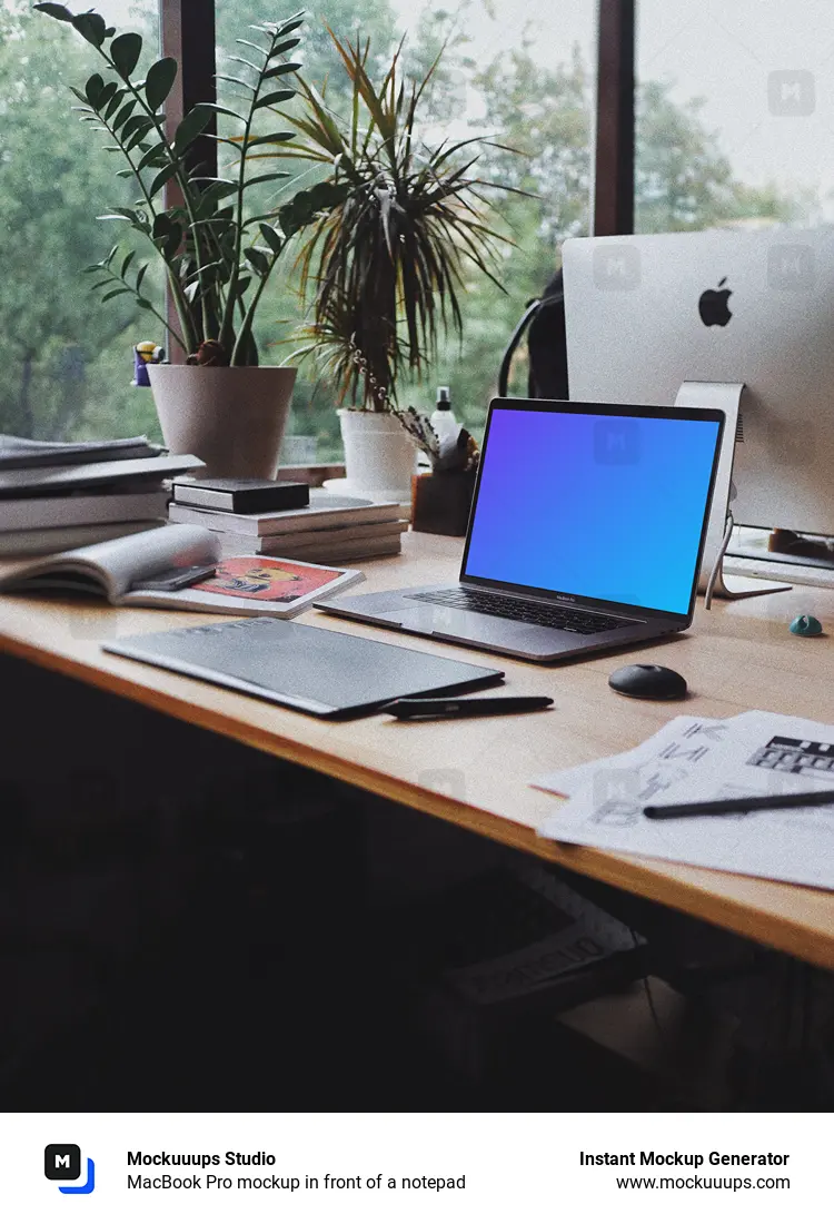 MacBook Pro mockup in front of a notepad