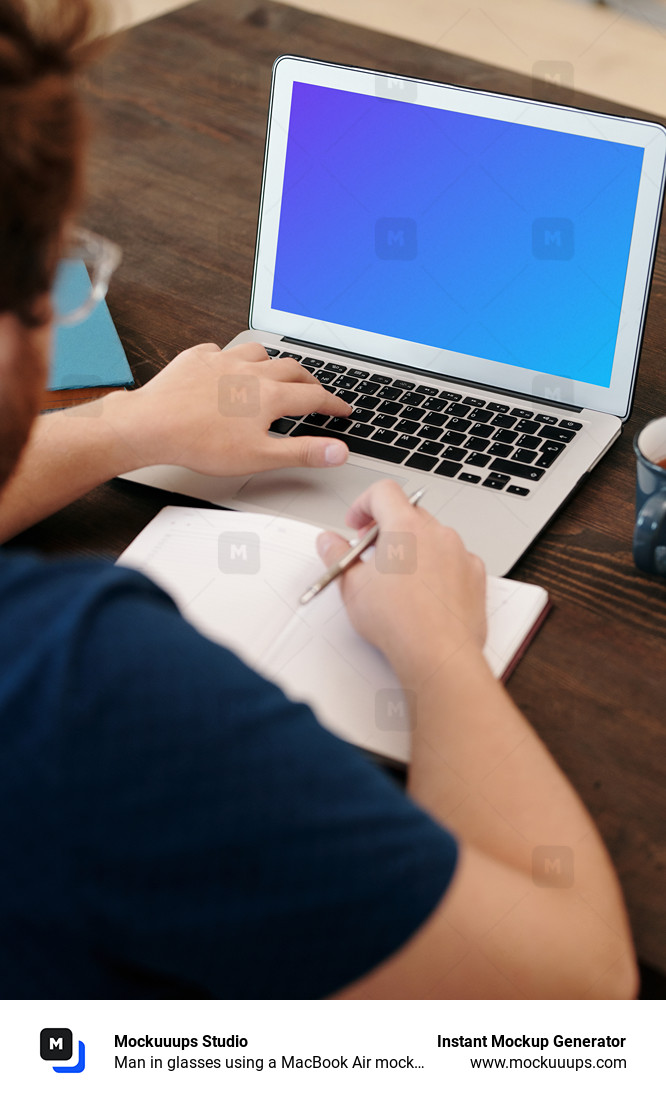 Man in glasses using a MacBook Air mockup