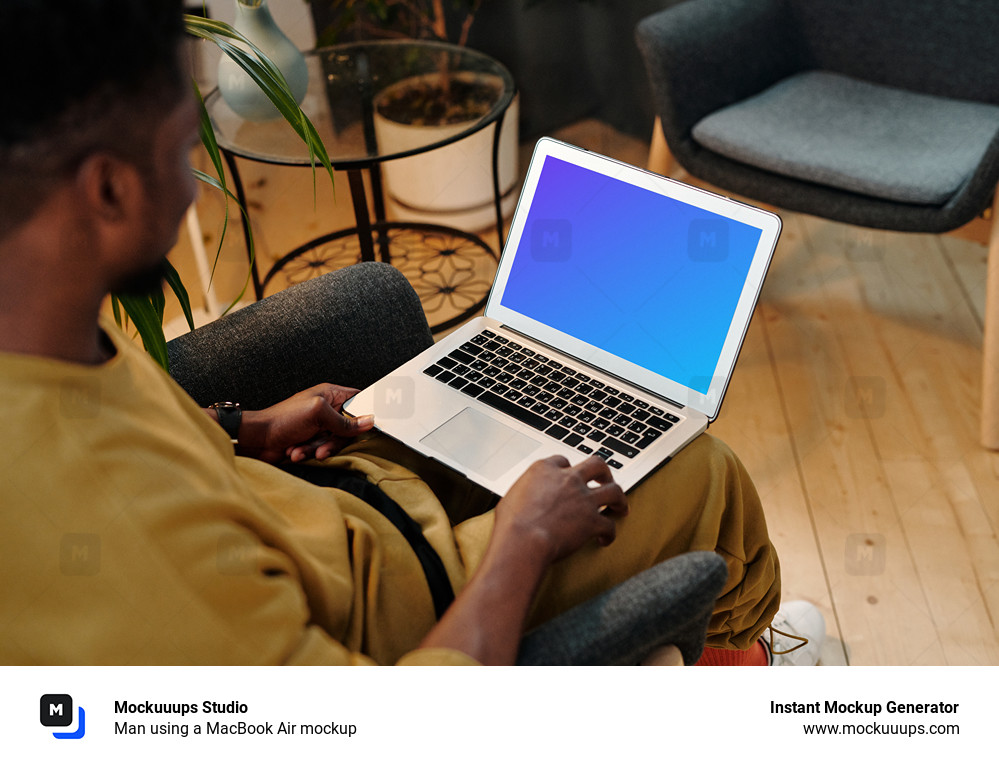 Man using a MacBook Air mockup